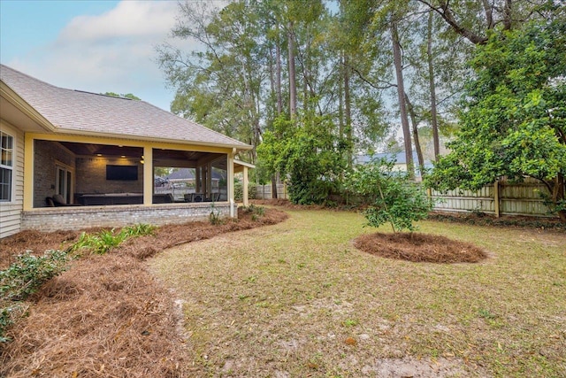 view of yard with fence