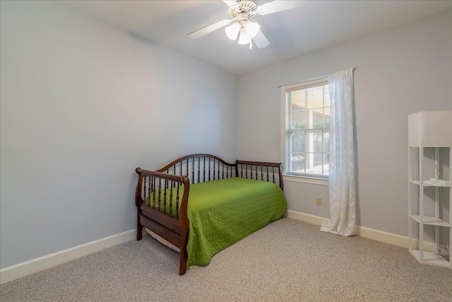 bedroom with carpet flooring, ceiling fan, and baseboards