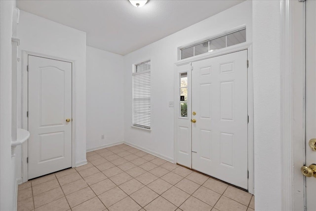 foyer with light tile patterned floors