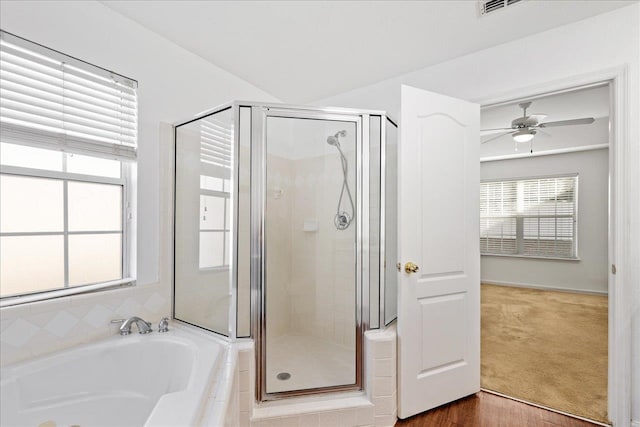 bathroom with separate shower and tub, wood-type flooring, ceiling fan, and plenty of natural light