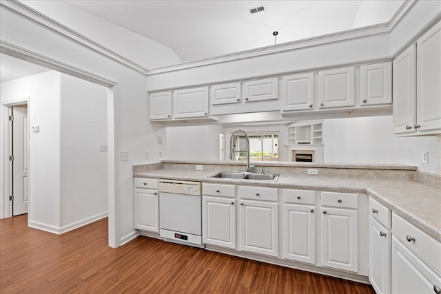 kitchen featuring dishwasher, hardwood / wood-style flooring, sink, and white cabinets