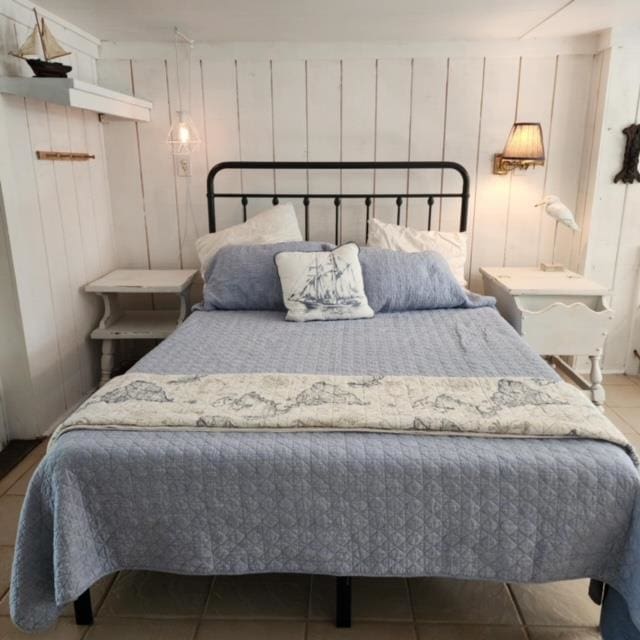 bedroom with tile patterned flooring