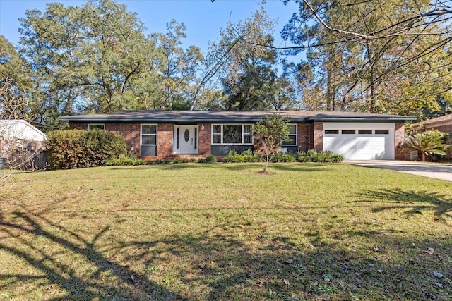 ranch-style house with a garage and a front yard