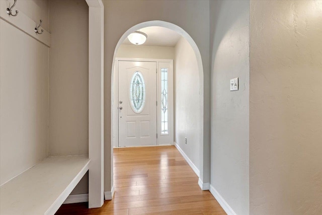 entryway with light hardwood / wood-style flooring