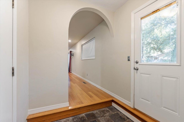 doorway to outside with dark hardwood / wood-style floors