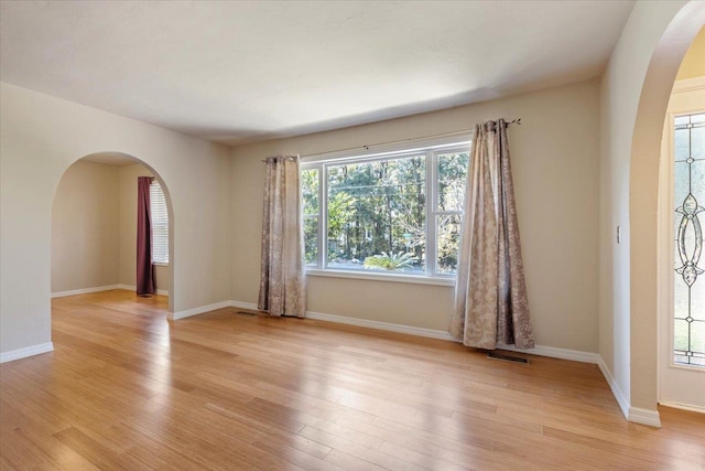 unfurnished room featuring light hardwood / wood-style flooring