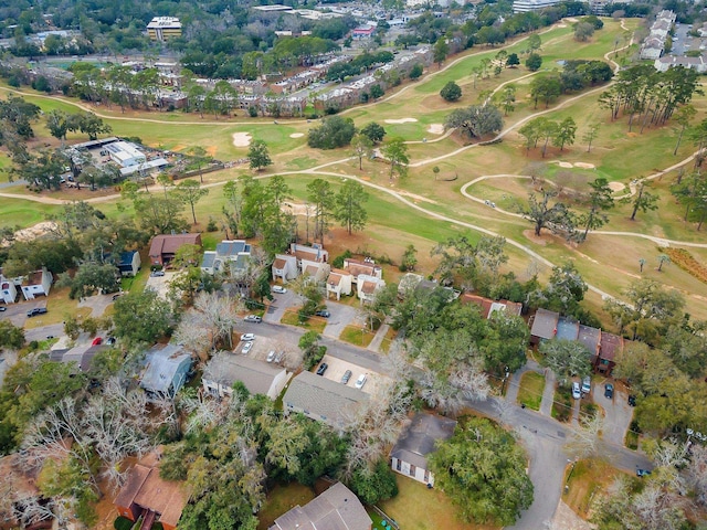 birds eye view of property with golf course view