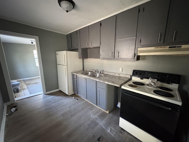 kitchen featuring a textured ceiling, gray cabinets, white appliances, and sink