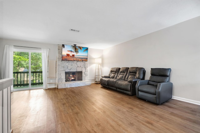 1200 Cross Creek Way Unit 4, Tallahassee, FL 32301 - living area featuring wood finished floors and a fireplace