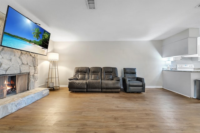 1200 Cross Creek Way Unit 4, Tallahassee, FL 32301 - living room featuring a fireplace and wood finished floors