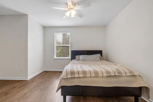 1200 Cross Creek Way Unit 4, Tallahassee, FL 32301 - bedroom with wood finished floors and a ceiling fan