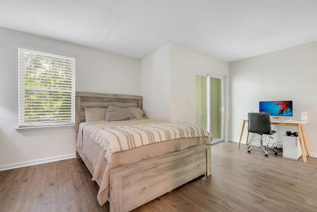 1200 Cross Creek Way Unit 4, Tallahassee, FL 32301 - bedroom with wood finished floors and access to exterior