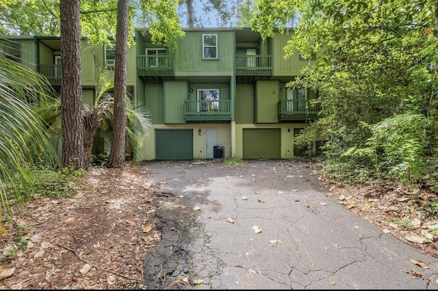 1200 Cross Creek Way Unit 4, Tallahassee, FL 32301 - view of front facade featuring asphalt driveway and a garage