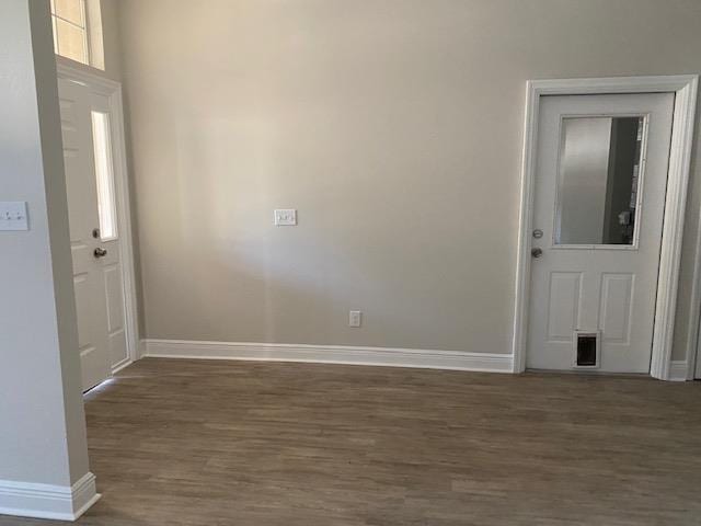 entrance foyer with dark hardwood / wood-style flooring