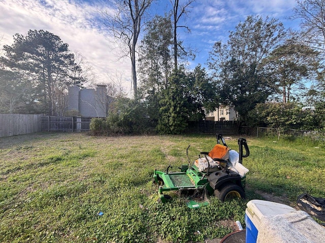 view of yard with a fenced backyard