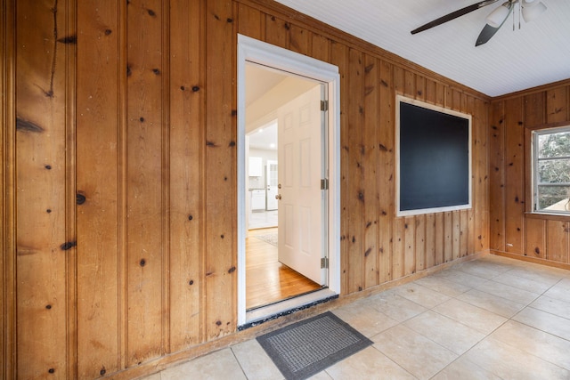 interior space featuring ceiling fan