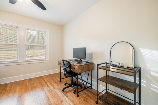 office with lofted ceiling, ceiling fan, and light hardwood / wood-style flooring