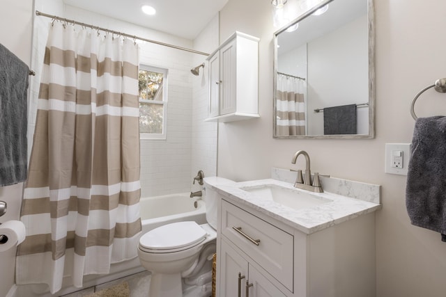 full bathroom with vanity, toilet, and shower / bath combo