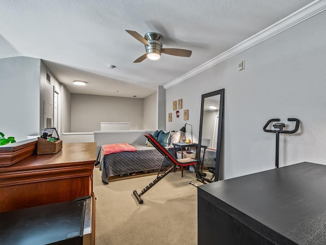 carpeted bedroom featuring ornamental molding and ceiling fan