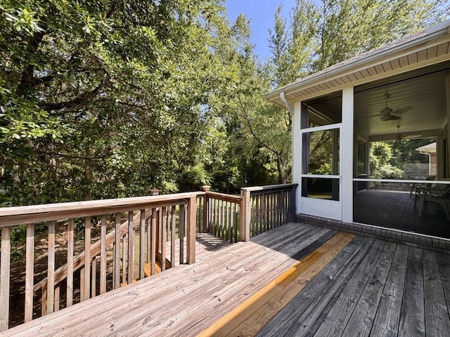 5672 Burnside Cir, Tallahassee, FL 32312 - deck featuring a sunroom and a ceiling fan