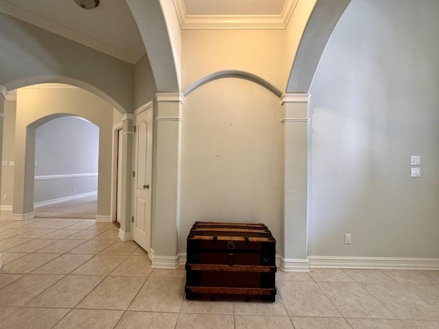 5672 Burnside Cir, Tallahassee, FL 32312 - corridor featuring arched walkways, tile patterned flooring, ornate columns, and crown molding
