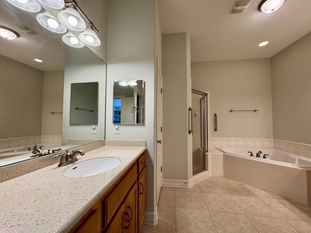 5672 Burnside Cir, Tallahassee, FL 32312 - full bath with vanity, a bath, a stall shower, and tile patterned floors