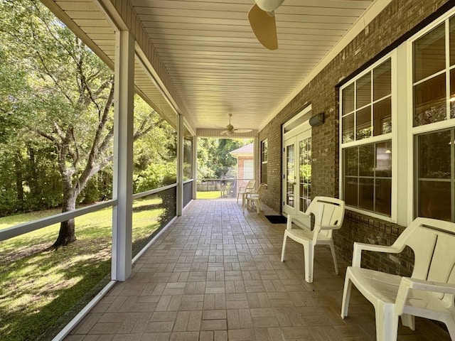 5672 Burnside Cir, Tallahassee, FL 32312 - covered porch featuring a ceiling fan and french doors