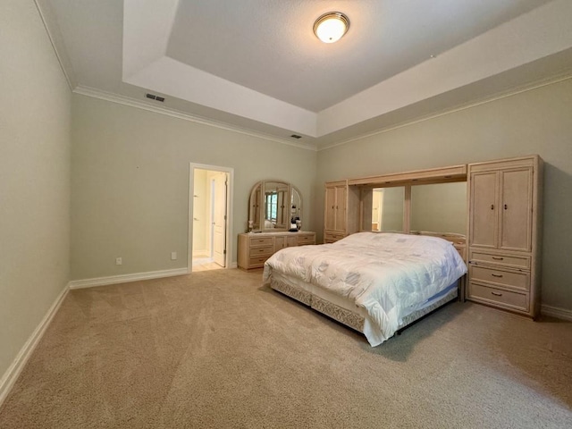 5672 Burnside Cir, Tallahassee, FL 32312 - carpeted bedroom featuring a raised ceiling and crown molding
