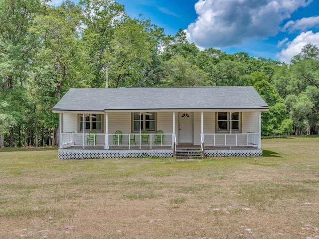 view of front of house with a porch and a front yard