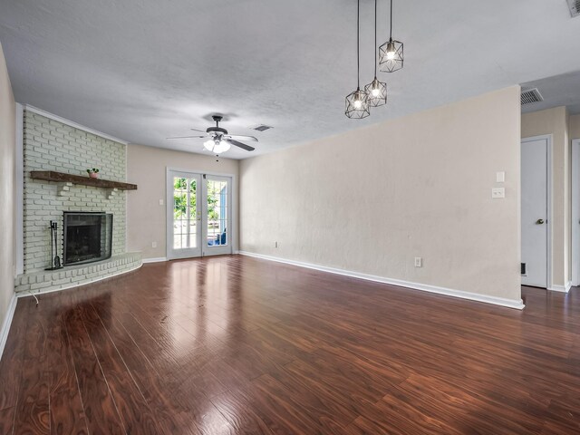 2600 Panther Creek Rd Unit A, Tallahassee, FL 32308 - unfurnished living room with wood finished floors, a ceiling fan, and a fireplace