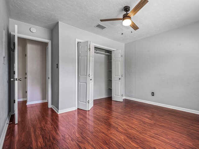 2600 Panther Creek Rd Unit A, Tallahassee, FL 32308 - unfurnished bedroom featuring wood finished floors, a closet, ceiling fan, and a textured ceiling
