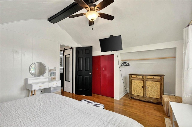1645 Tallavana Trl, Havana, FL 32333 - bedroom featuring wood finished floors, a barn door, and ceiling fan