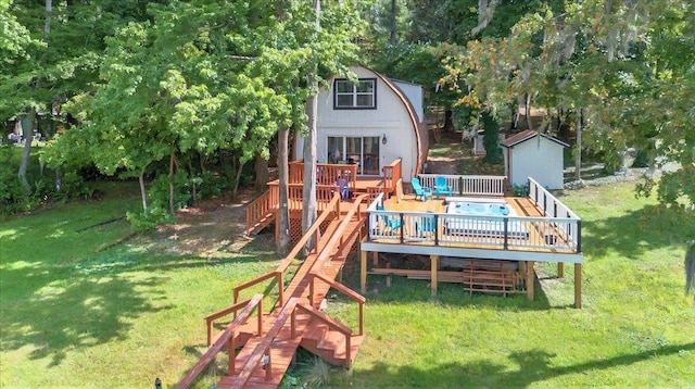 1645 Tallavana Trl, Havana, FL 32333 - view of play area with a deck, a yard, and stairs
