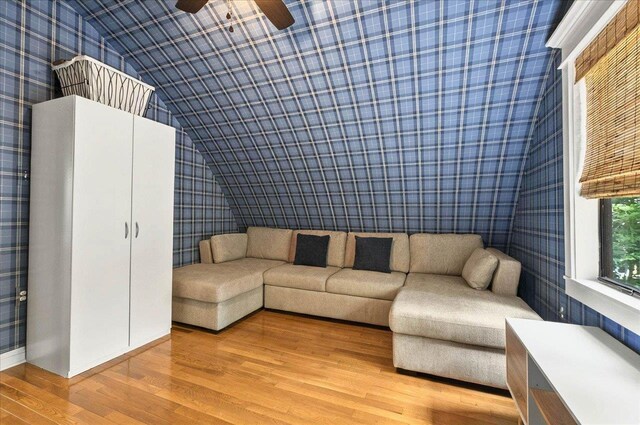 1645 Tallavana Trl, Havana, FL 32333 - living room with wallpapered walls, wood finished floors, a ceiling fan, baseboards, and vaulted ceiling