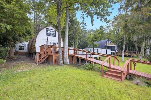 1645 Tallavana Trl, Havana, FL 32333 - back of property with stairway, a deck, a lawn, and a gambrel roof