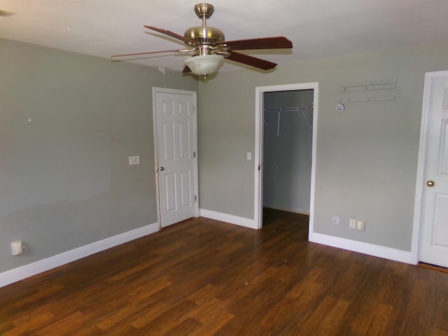 402 W Brent St, Chattahoochee, FL 32324 - unfurnished bedroom featuring wood finished floors, ceiling fan, a spacious closet, and a closet
