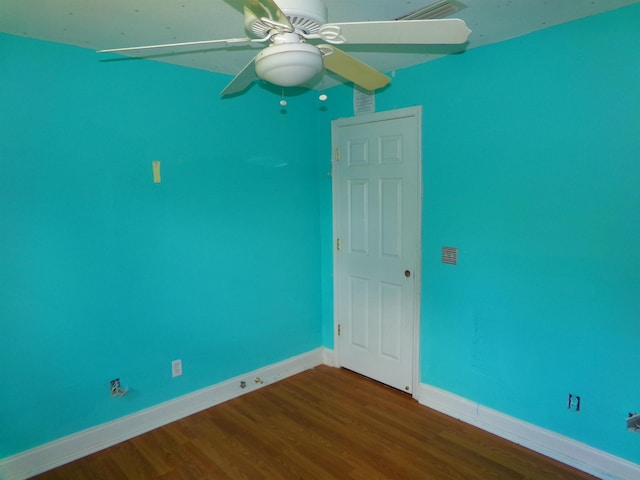 402 W Brent St, Chattahoochee, FL 32324 - empty room featuring dark wood-type flooring and a ceiling fan