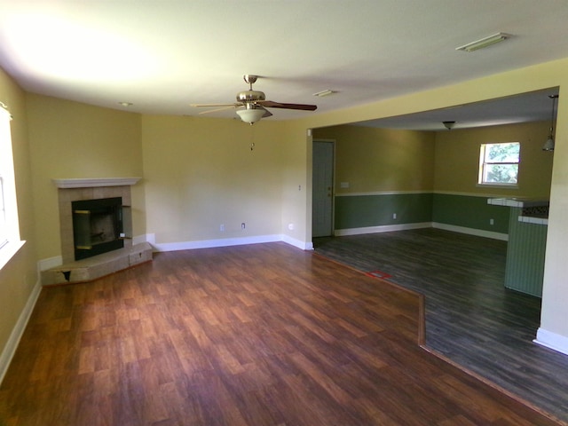 402 W Brent St, Chattahoochee, FL 32324 - unfurnished living room with a fireplace, wood finished floors, and ceiling fan