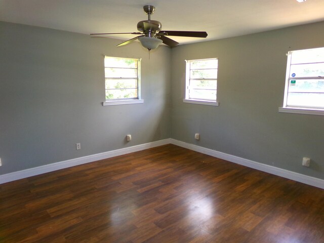 402 W Brent St, Chattahoochee, FL 32324 - spare room featuring dark wood-type flooring and a ceiling fan