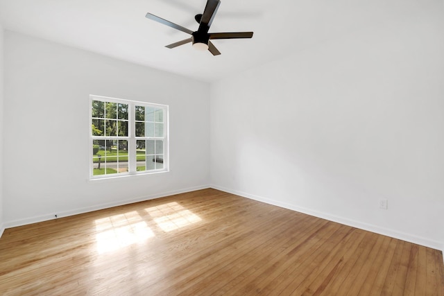 unfurnished room featuring light hardwood / wood-style floors and ceiling fan