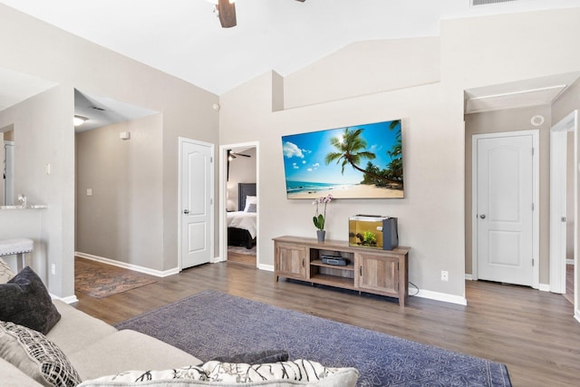 living room with high vaulted ceiling, dark hardwood / wood-style floors, and ceiling fan