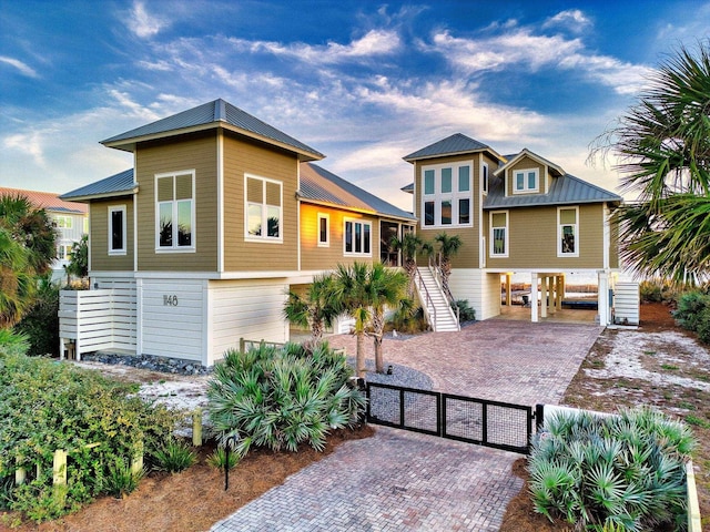 view of front of house featuring a carport