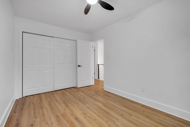 246 Intrepid Ct, Tallahassee, FL 32312 - unfurnished bedroom with light wood finished floors, baseboards, a closet, and ceiling fan