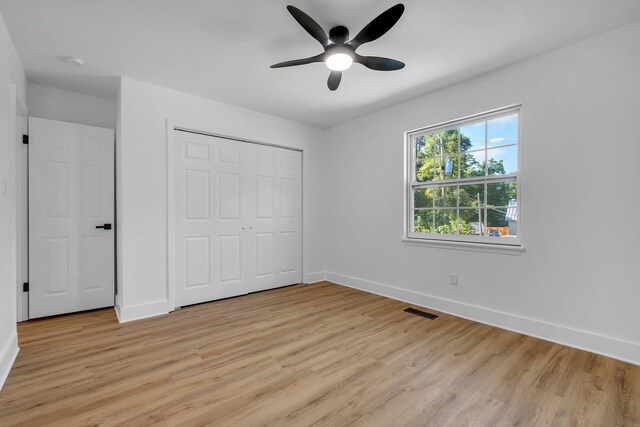 246 Intrepid Ct, Tallahassee, FL 32312 - unfurnished bedroom featuring baseboards, light wood-type flooring, and a closet