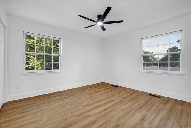 246 Intrepid Ct, Tallahassee, FL 32312 - unfurnished room with healthy amount of natural light, light wood-style floors, baseboards, and ceiling fan