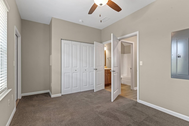 2249 Del Carmel Way Unit 1302, Tallahassee, FL 32303 - unfurnished bedroom featuring carpet floors, baseboards, a closet, and ceiling fan