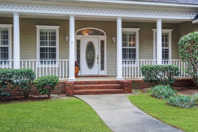 entrance to property with a porch