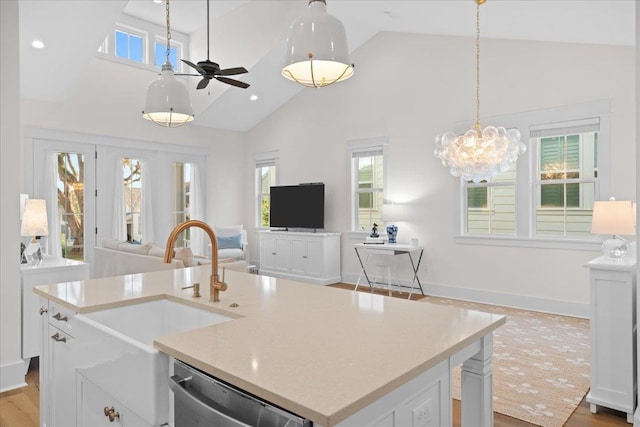 190 Camellia Oaks Ave Unit 96, Tallahassee, FL 32317 - kitchen with open floor plan, stainless steel dishwasher, high vaulted ceiling, a ceiling fan, and a sink