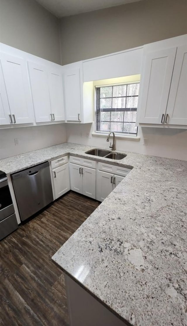 2585 Panther Creek Rd, Tallahassee, FL 32308 - kitchen featuring dishwasher, dark wood-type flooring, white cabinetry, and light stone countertops