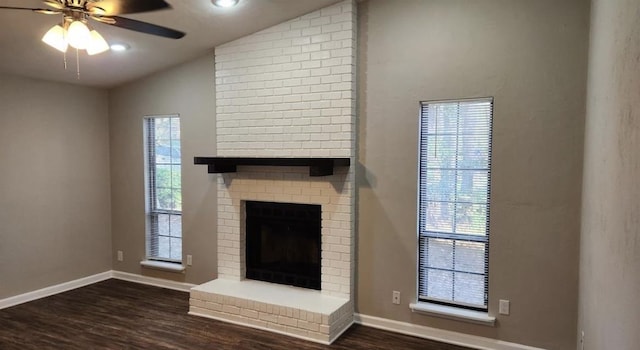 2585 Panther Creek Rd, Tallahassee, FL 32308 - unfurnished living room with lofted ceiling, dark wood finished floors, ceiling fan, a fireplace, and recessed lighting